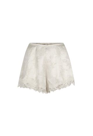 off-white-lace-shorts-with-a-subtle-floral-jacquard-pattern-and-a-scalloped-lace-hem-shown-against-a-plain-white-background